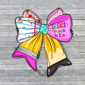 May include: A decorative bow-shaped design featuring a pencil and school-themed patterns. The bow has a yellow pencil design with a pink eraser and black tip. The bow also has the text "Teach Them to Be Kind" in pink.