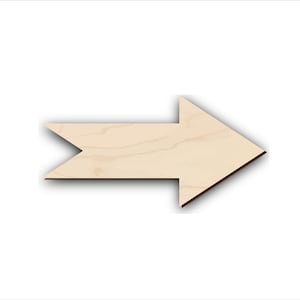 Puede incluir: Una flecha de madera apuntando hacia la derecha. La flecha está hecha de madera marrón claro con un patrón de veta natural.