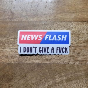 News Flash I Don't Give A Fuck Die Cut Matte Water Resistant Sticker for hard hats, tool boxes, and much more made by Artsy not Craftsy
