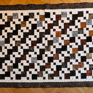 Patchwork quilt blanket: Red-brown checked blanket with Bali batik fabrics