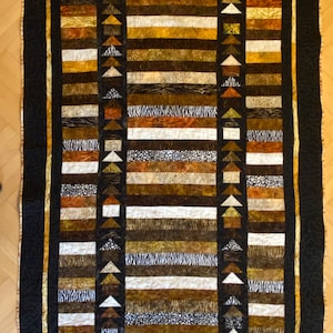 Patchwork quilt blanket: African mood made from Bali batik fabrics