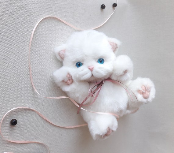 white cat teddy