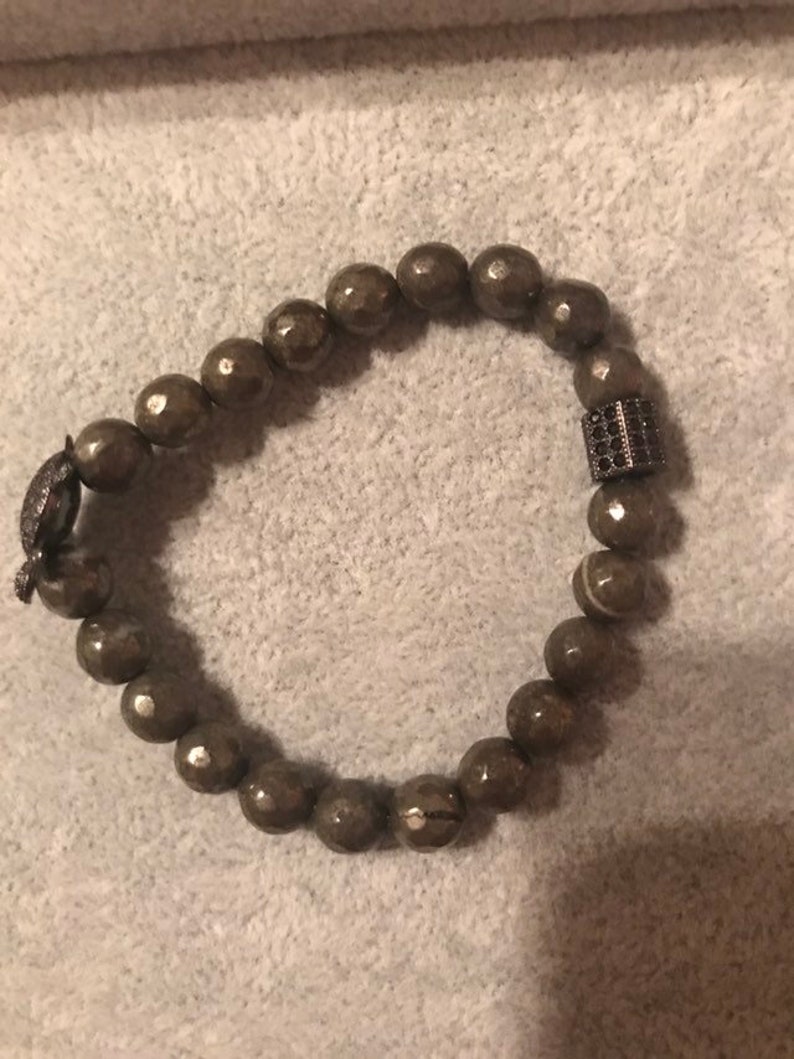 Pyrite and pave turtle bead bracelet with black pave bead accent Turtle symbolizes perseverance.