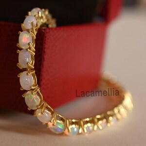 Gold opal tennis bracelet top