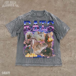 A grey t-shirt with a graphic design featuring a group of rats and cheese.