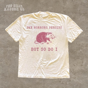 Funny Opossum Tee, The Horrors Persist But So Do I Shirt, Vintage Mental Health Gift for Men Women, Sarcastic Goblincore T-shirt