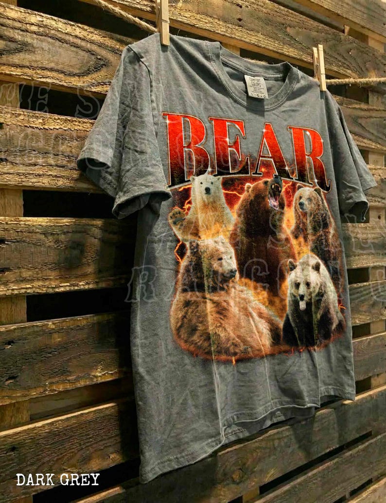 A grey t-shirt with a graphic design of a group of bears, with the word "BEAR" prominently displayed in red letters.
