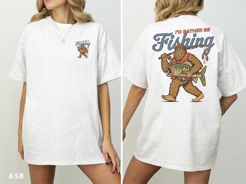 A woman wearing a white t-shirt with a graphic design of a fishing giant on the back.