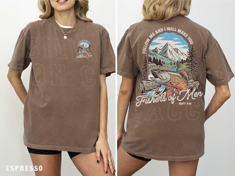 a woman wearing a brown t-shirt with a graphic design on the back. The design includes a mountain landscape with a fish, and the text "Follow Me and I will make you" along with "Fishers of Men" and "Matt. 4:9".