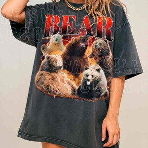 A woman wearing a black t-shirt with a graphic design of multiple bears.