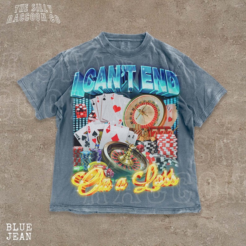A t-shirt with a graphic design featuring various casino-related elements, such as playing cards, poker chips, and a roulette wheel. The text on the t-shirt reads "I CAN'T END" and "On a Loss".