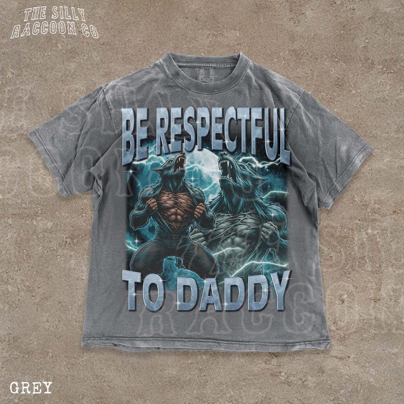 A grey t-shirt with a graphic design featuring two werewolves and the text "BE RESPECTFUL TO DADDY" printed on it.