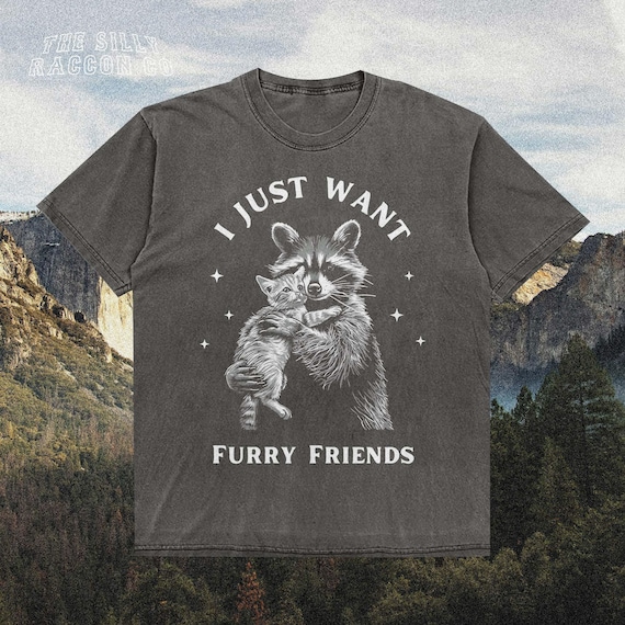 Raccoon and Cat Graphic Tee | Funny Animal Shirt | Furry Friends T-Shirt | Whimsical Gift for Pet Lovers | Wildlife Gift Idea