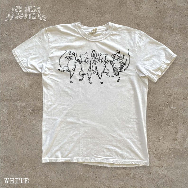 A white t-shirt with a black illustration of five mice dancing together.
