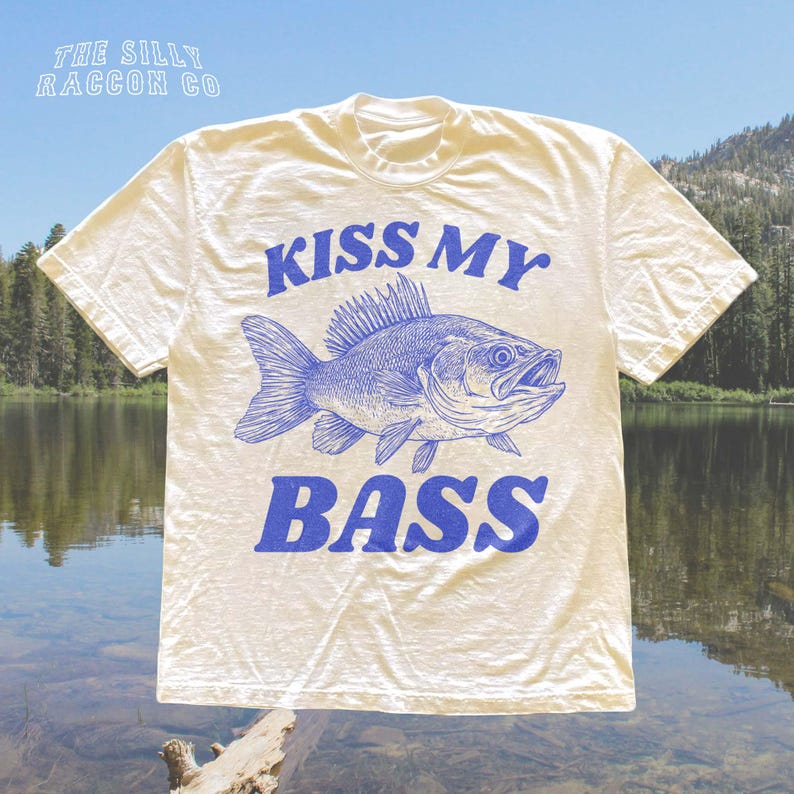 a t - shirt that says kiss my bass on it