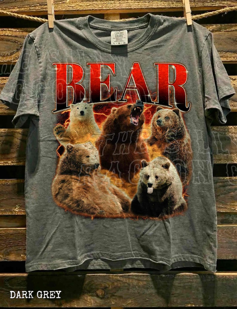 A grey t-shirt with a graphic design featuring a group of bears in various poses.