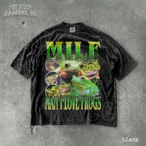 A black t-shirt with a graphic design featuring multiple images of frogs.