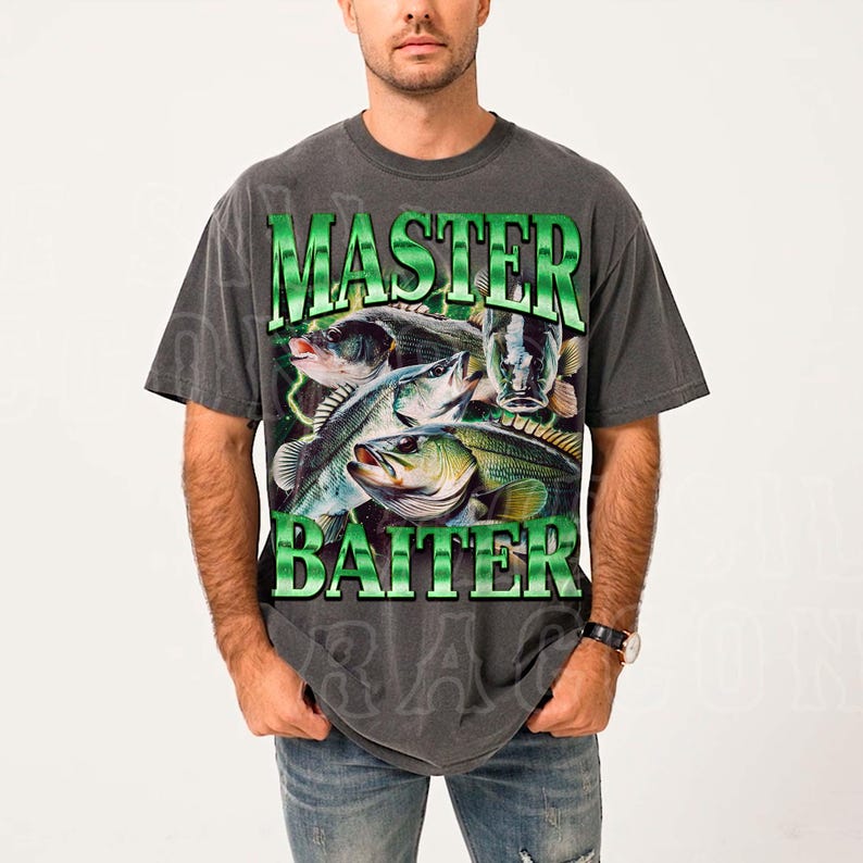 A man wearing a gray t-shirt with a graphic design featuring fish and the text "MASTER BAITER" printed on it.