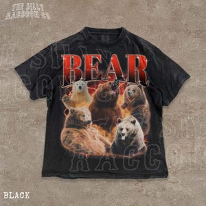 A black t-shirt with a graphic design featuring a group of bears in various poses, including one bear with its mouth open.