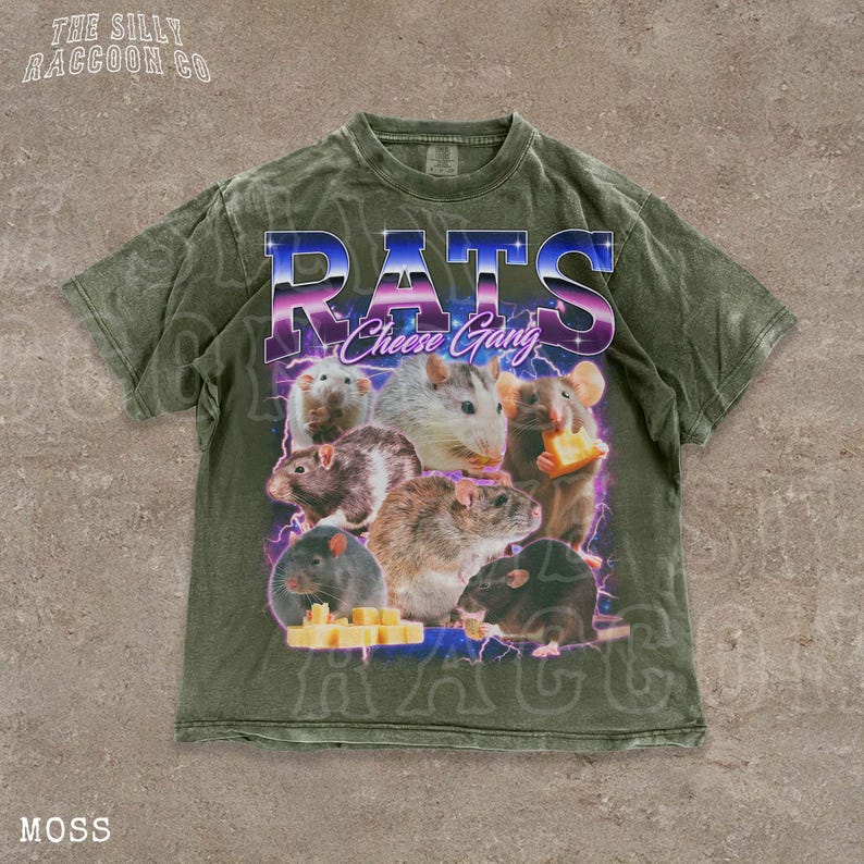 A t-shirt with a graphic design featuring a group of rats and cheese, along with the text "RATS Cheese Gang" printed on it.
