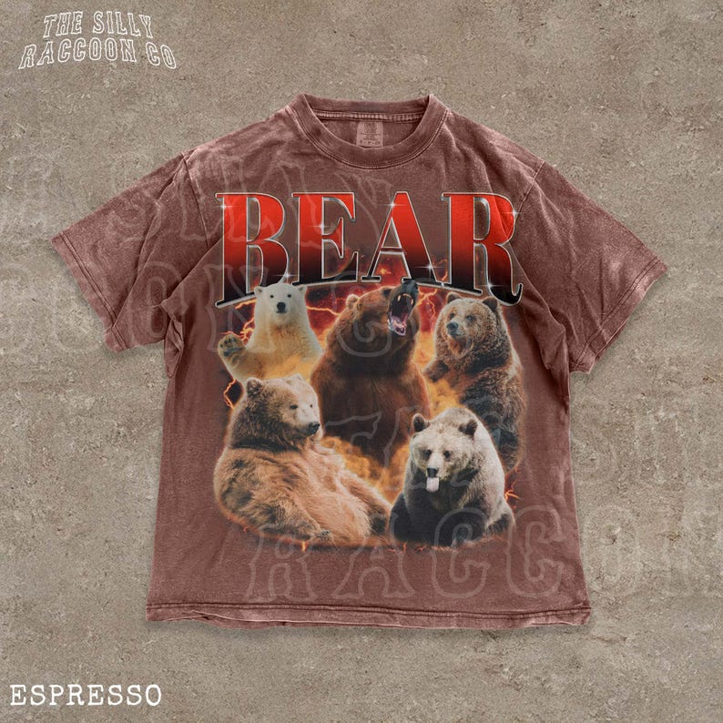 A t-shirt with a graphic design featuring a group of bears, including a large bear in the center surrounded by smaller bears.