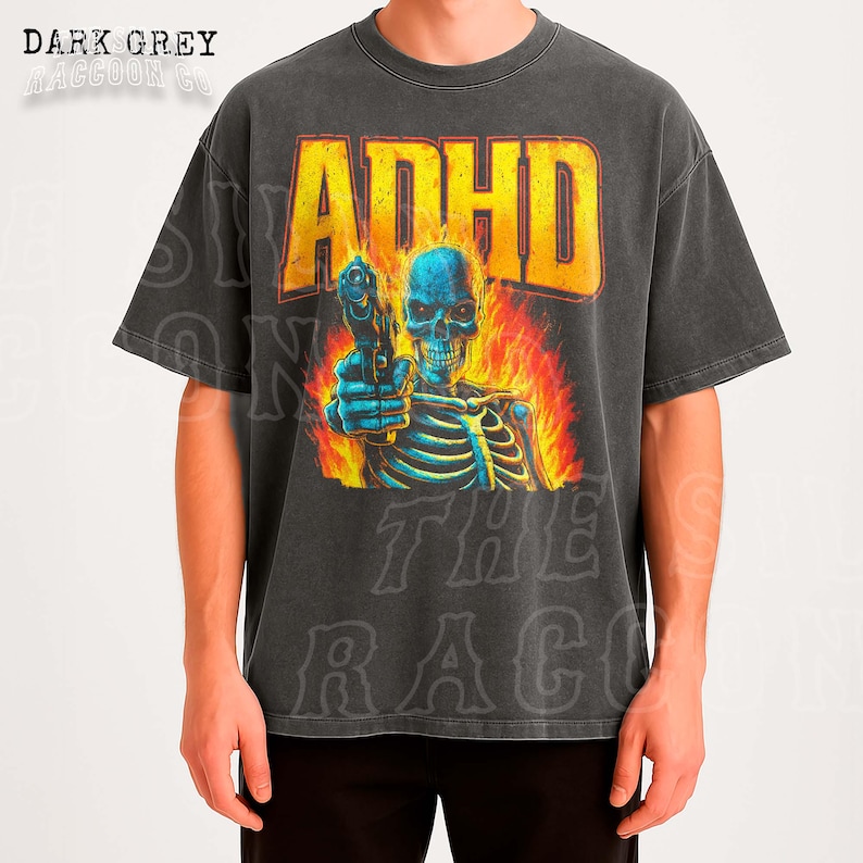 a graphic t-shirt with a skull and flames, along with the text "ADHD" prominently displayed.