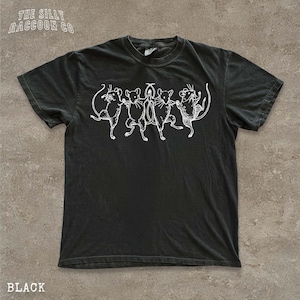 A black t-shirt with a graphic design of five cats in various poses, including one standing on its hind legs.
