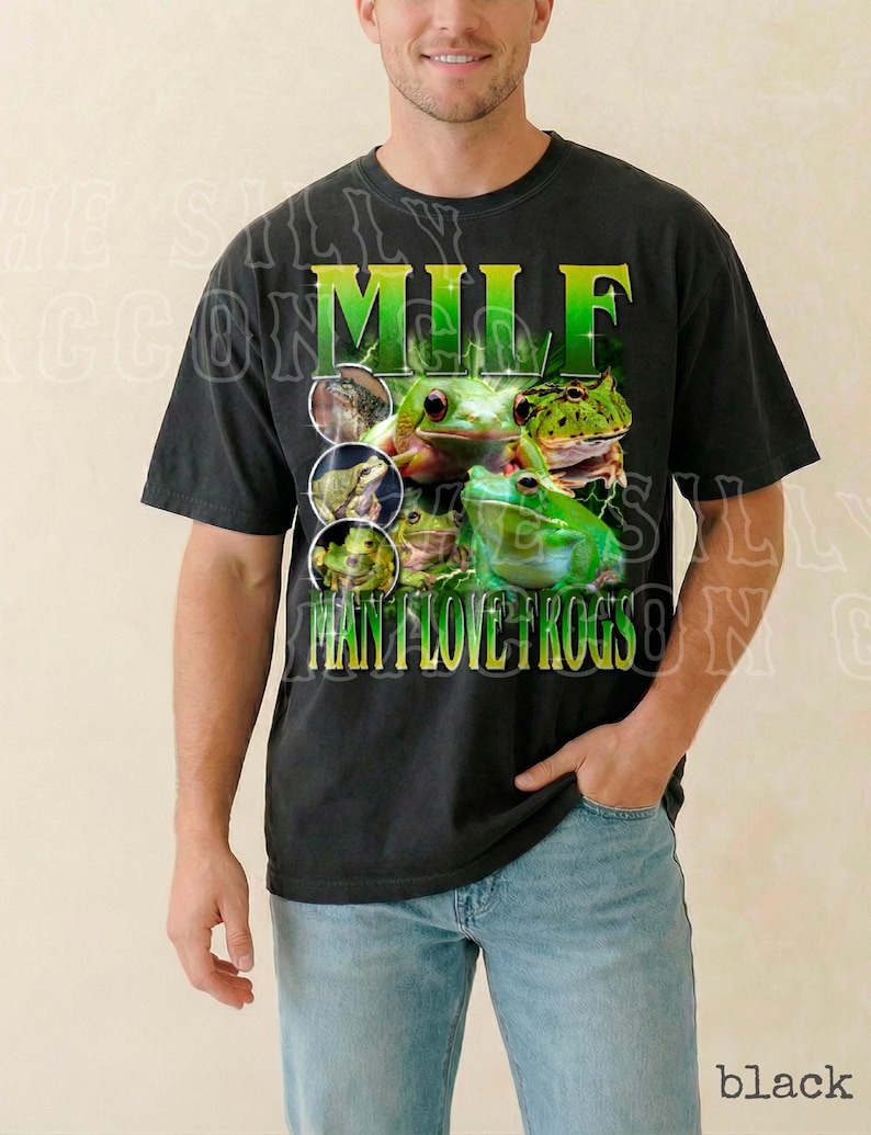 A man wearing a black t-shirt with a graphic design featuring a frog and the text "MILF MAN FLOYD ROGS" printed on it.