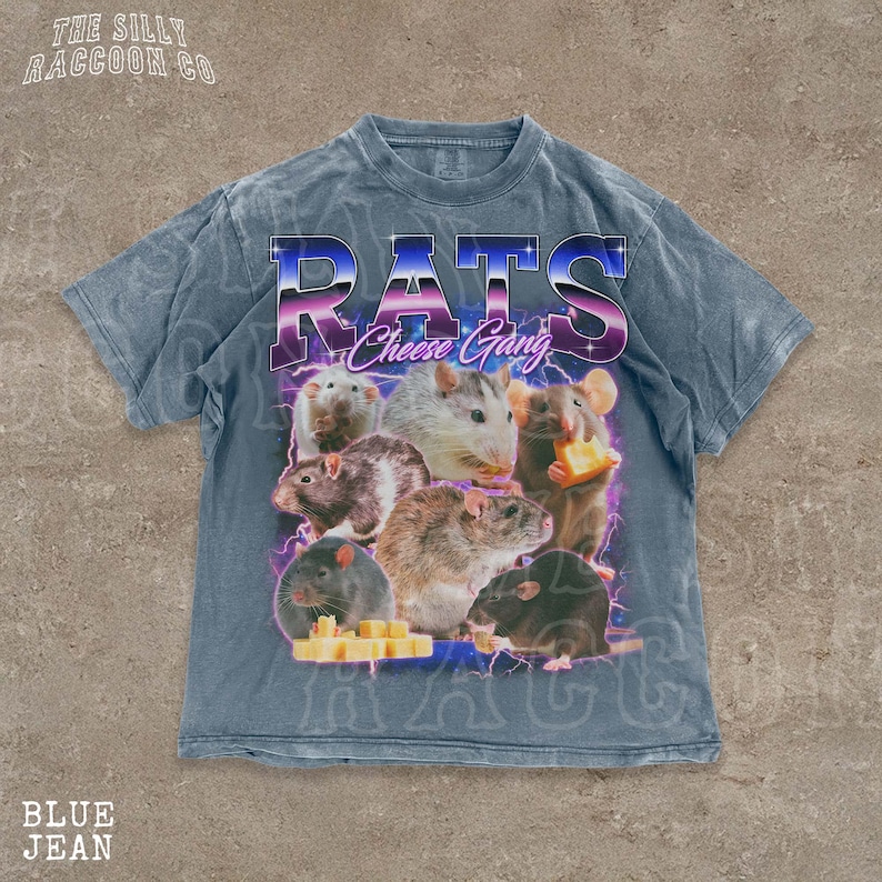 A t-shirt with a graphic design featuring a group of rats and cheese, along with the text "RATS Cheese Gang" printed on it.