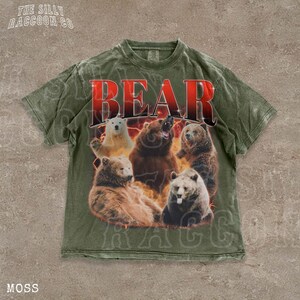 A t-shirt with a graphic design featuring a group of bears in various poses, including one bear with its mouth open.
