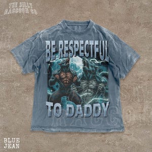 A t-shirt with a graphic design featuring two werewolves and the text "BE RESPECTFUL TO DADDY" printed on it.