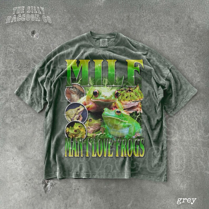 A grey t-shirt with a graphic design featuring multiple images of frogs.