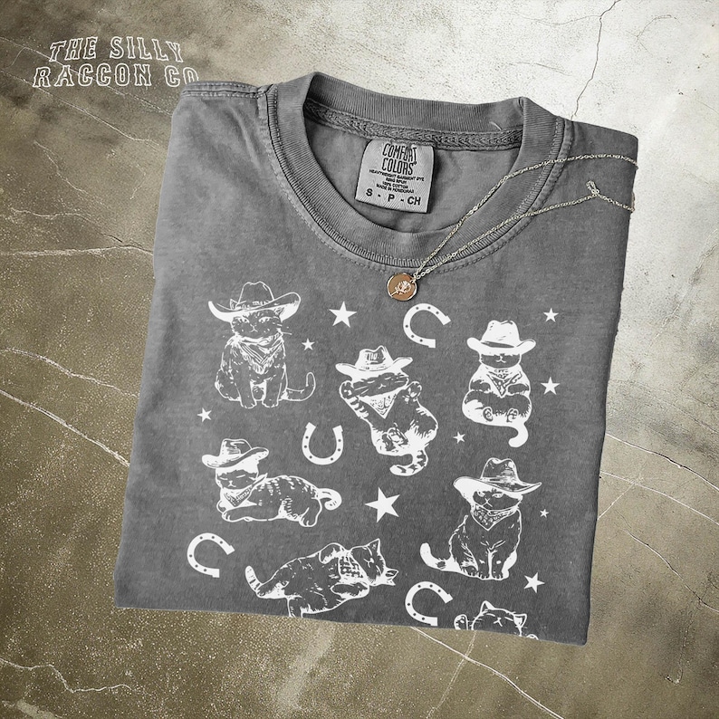a t - shirt with a picture of a cowboy on it