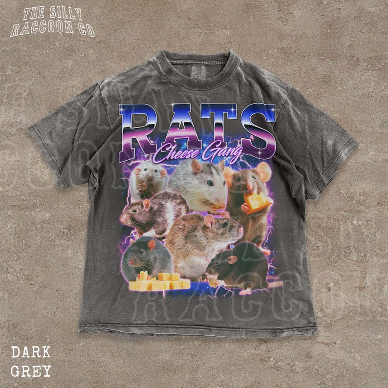 A t-shirt with a graphic design featuring a group of rats and cheese, along with the text "RATS Cheese Gang" printed on it.