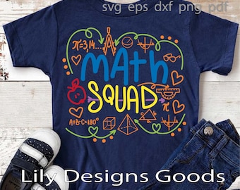 May include: A blue t-shirt with the text "Math Squad" in colorful letters surrounded by math symbols and hearts. The shirt is on a wooden surface with a pair of black and white shoes and blue jeans.