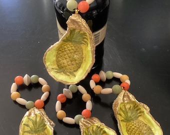 Anillo para servilletas con forma de piña, etiqueta para botella de vino con forma de concha de ostra, concha grande