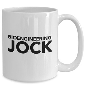 May include: White ceramic coffee mug with a black design that says "Bioengineering Jock".