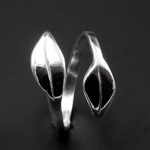 Sterling Silver ring in spring leaves shape. The size is adjustable.