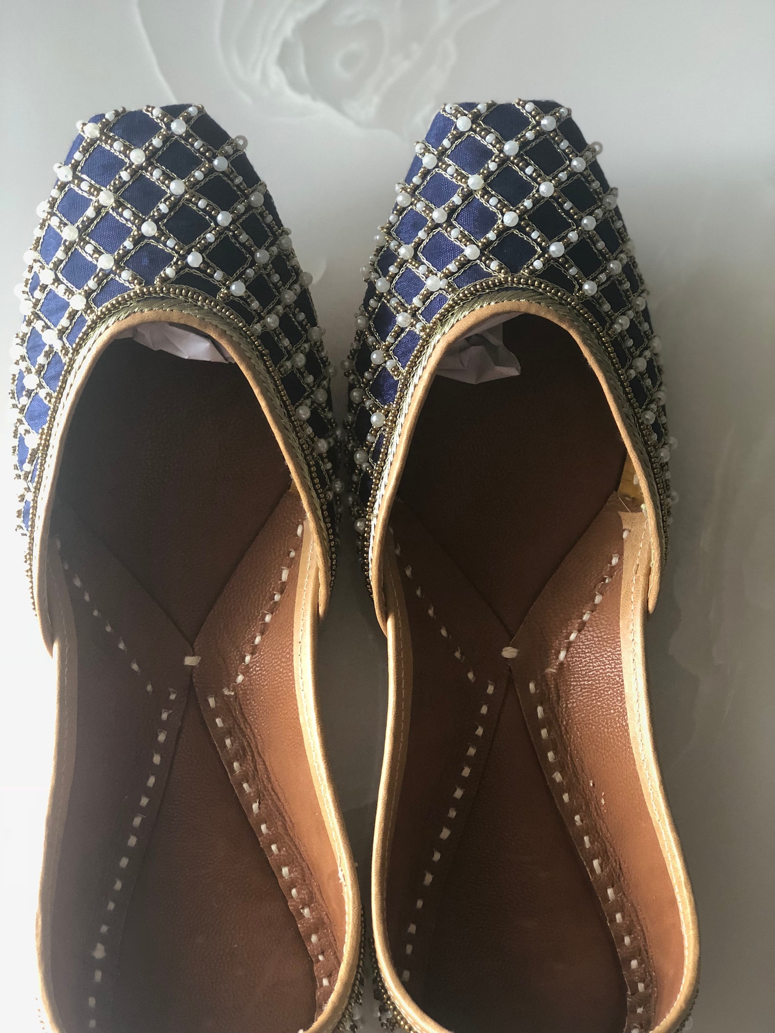 blue bridal shoes, indian ethnic juttis, embellished wedding shoes, white beaded punjabi juttis, indian footwear, blue ballet sh