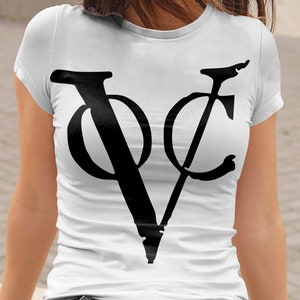 May include: White t-shirt with a black graphic of the letters "VC" in a stylized font.