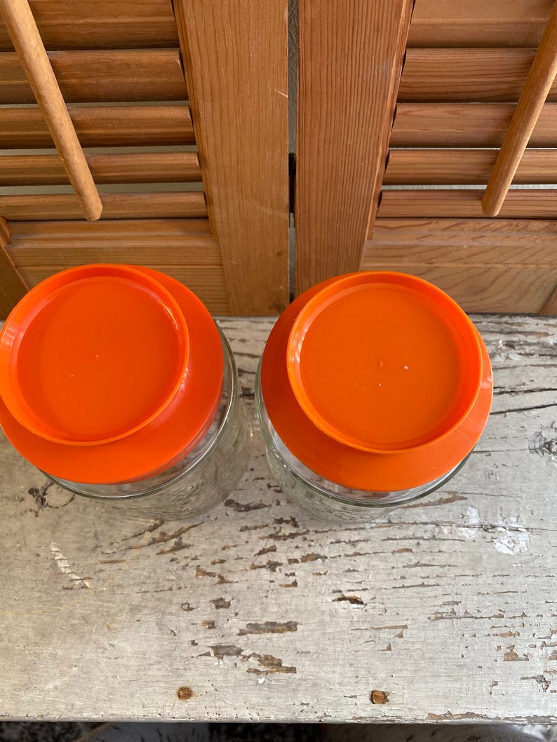 Vintage Anchor Hocking Lilies of the Valley Glass Canisters Bright Orange Lids