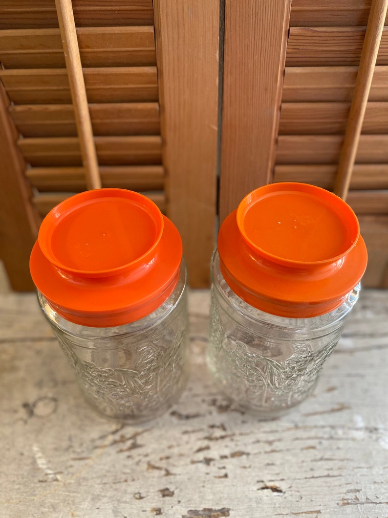 Vintage Anchor Hocking Lilies of the Valley Glass Canisters Bright Orange Lids
