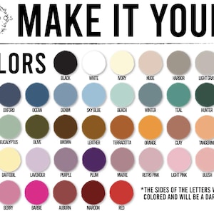 May include: A color chart titled MAKE IT YOURS by TWO AVOCADOS SIGNS, displaying forty-two circular color swatches with labels including black, white, ivory, navy, sage, orange, and red. A note states the sides of the letters will be dark.