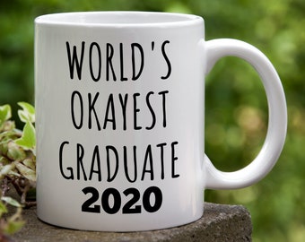 Funny Graduation Gift / World's Okayest Graduate 2020 Coffee Mug / Gift for New Grad / High School Bachelor Masters Doctorate PhD Gift 2020