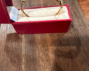 Vintage 14k gold and jade bangle bracelet.