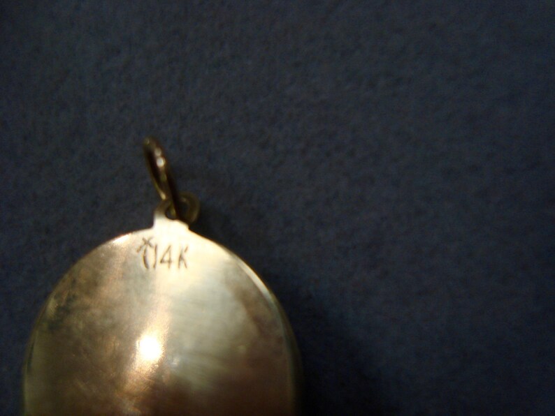 Vintage 14k gold clubs and pearl medallioncharm