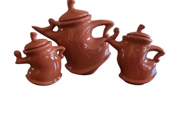 Orange Sassy Ceramic Dancing Whimsical Teapots Set Of 3