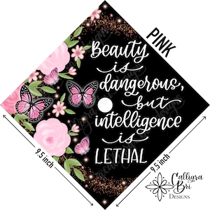 May include: A black graduation cap with a pink floral design and gold glitter. The text "Beauty is dangerous, but intelligence is lethal" is written in white on the cap. The cap is 9.5 inches wide.