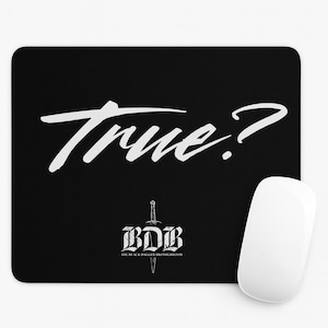May include: Black mousepad with the word "True?" in white script. Below the text is a logo with the letters "BDB" and a dagger. A white computer mouse is on the right side of the mousepad.