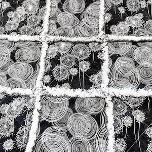 Modern graphic black white and silver dandelions and circles in silver metallic